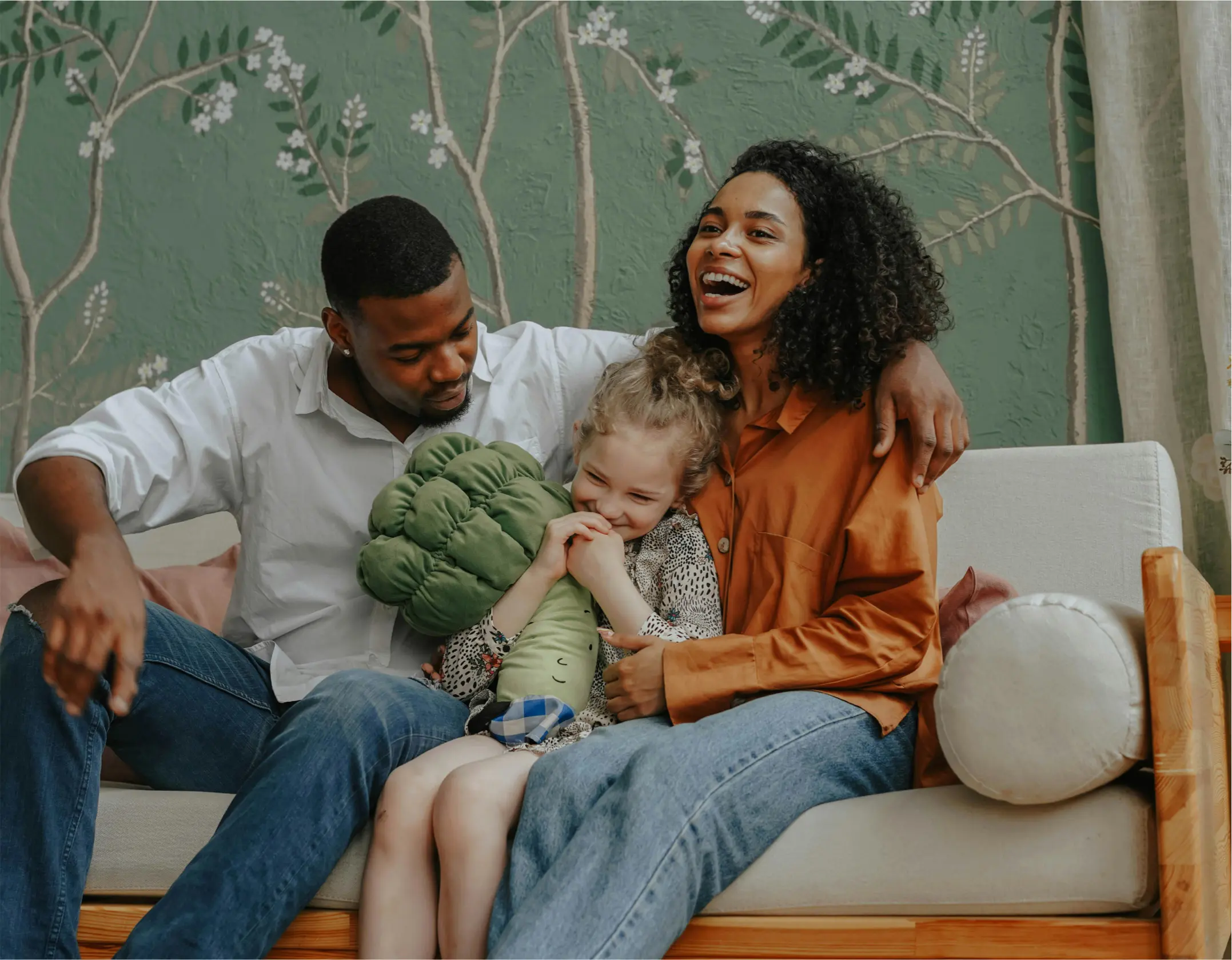 Family enjoying time together on couch.