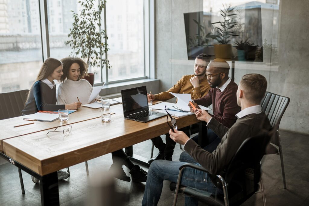Team meeting in modern office setting.